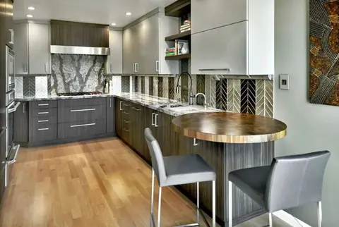 Gray kitchen with round breakfast table