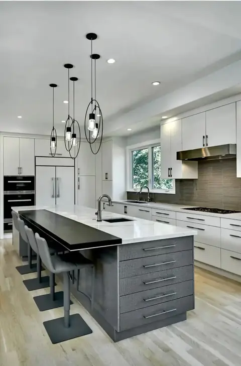 Kitchen with large island and pendant lights